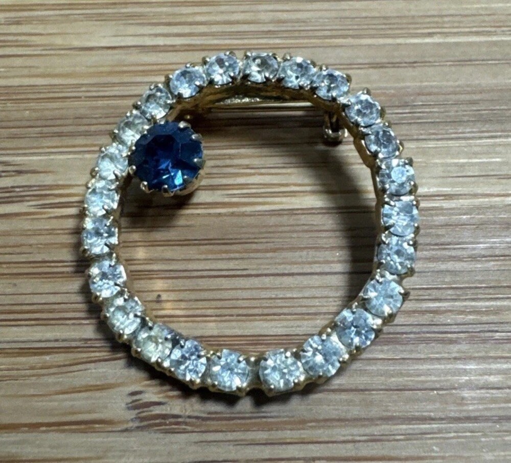 Vintage Rhinestone Circle Brooch Blue Clear Crystal Gold Tone Wreath Pin